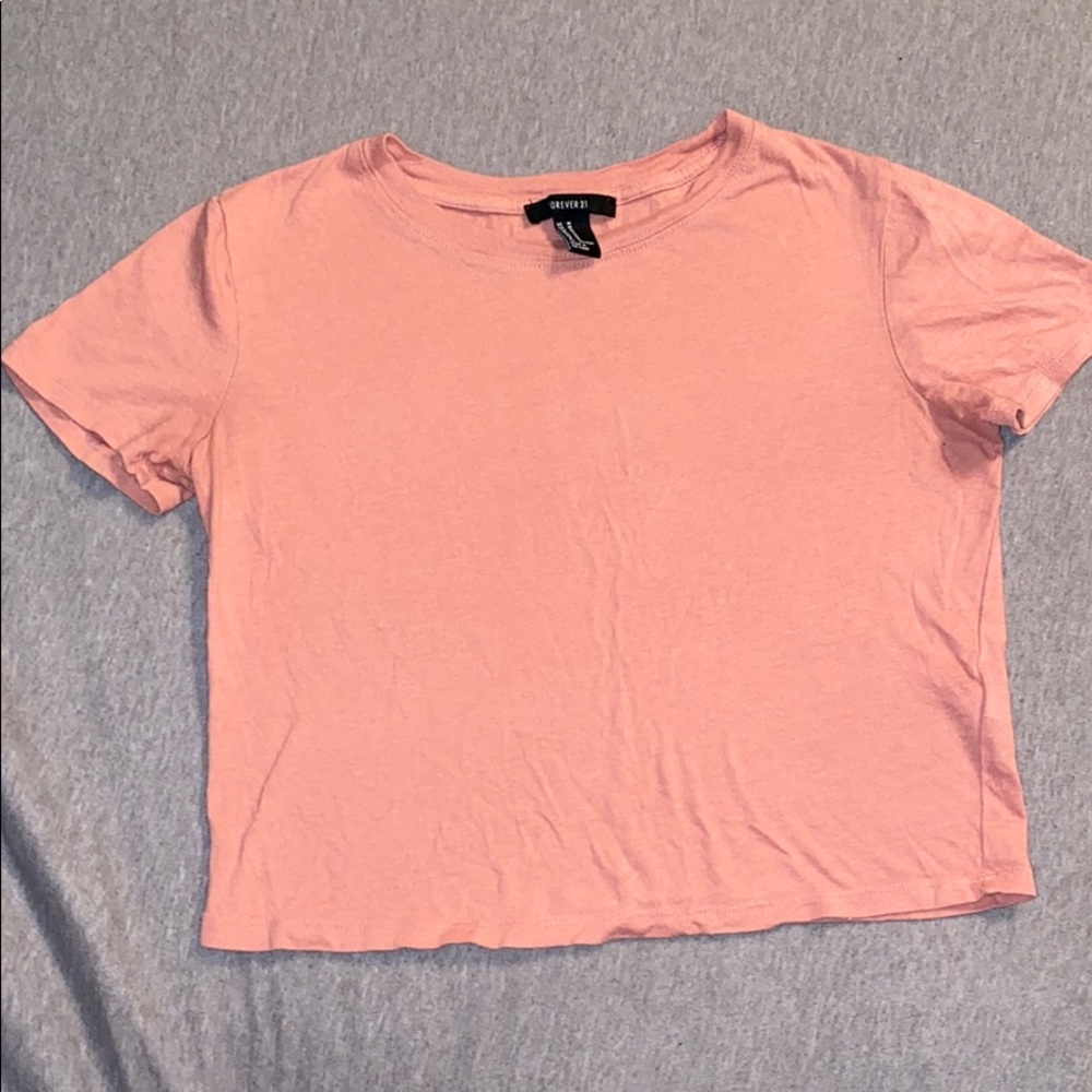 pink cropped shirt